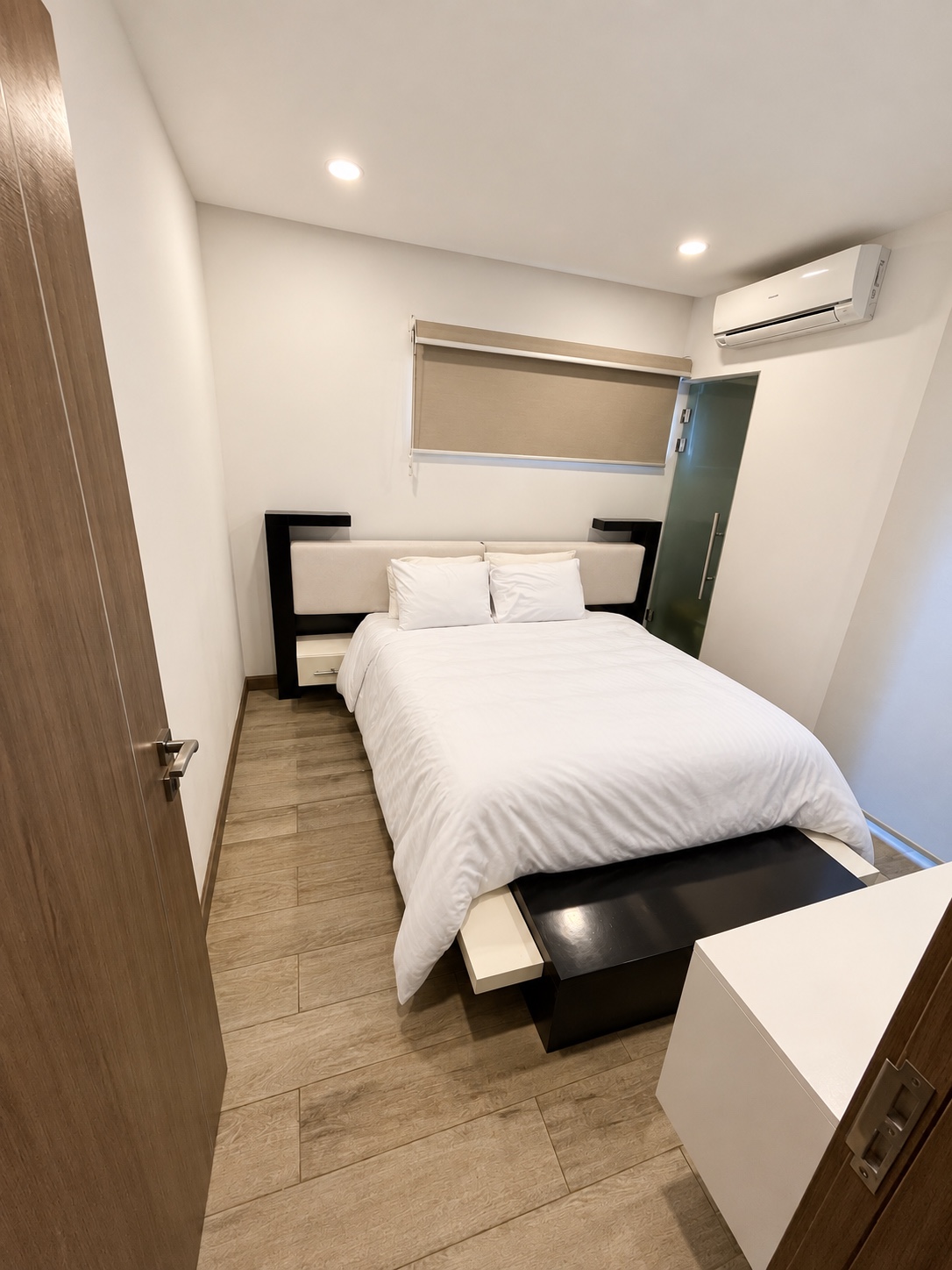 Habitación 4 con cama queen y aire acondicionado